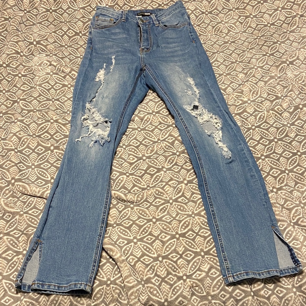 Fashion Nova Distressed Flare Jeans in Light Blue
